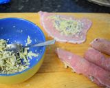 A picture of step 1 of Rolled pork chops filled with "cheesy surprise" avocado salad a fried potato chips.