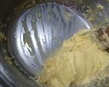 Foto del paso 5 de la receta: Bombas rellenas de dulce de leche y baño de chocolate
