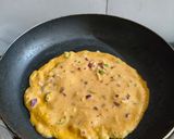 A picture of step 2 of Besan greenchill onion Chilla.