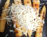 A picture of step 3 of Grilled cheesy babycorn.