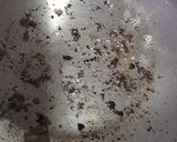 A picture of step 5 of Gajar ka halwa with peels.