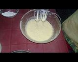 A picture of step 2 of Australian cake.. chocalate toping on vanilla cake.