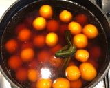 A picture of step 6 of Kolak Biji Salak - Sweet potato balls in palm sugar syrup and coconut milk.