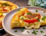 A picture of step 7 of Tomato & Mozzarella Breakfast Pie with Cottage Cheese Dough.