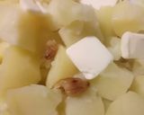 A picture of step 3 of Roasted garlic and parsley mash.