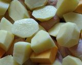 Foto del paso 3 de la receta: Alitas a la mostaza con papas y calabaza al horno