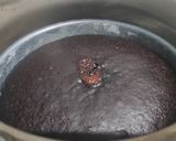 A picture of step 3 of Brownie cake with chocolate syrup.