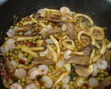 Foto del paso 3 de la receta: Arroz con setas y calamar