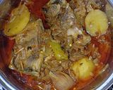A picture of step 14 of Hilsa fish salan.