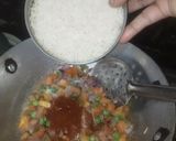A picture of step 3 of Leftover schezwan onion pulao.
