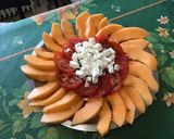Une image de l'étape 8 de Salade de melon, tomates et feta.