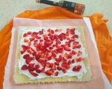 A picture of step 24 of Strawberry Vanilla Roll Cake.