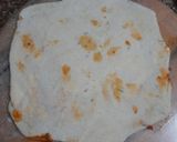 A picture of step 7 of Cheesy pizza sauce paratha.