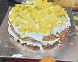 A picture of step 7 of Cricket pitch cake with fruit flavour.