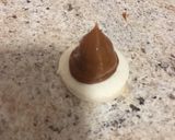 Foto del paso 5 de la receta: Conitos de dulce de leche y alfajores