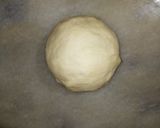 A picture of step 12 of Aloo walay nan.