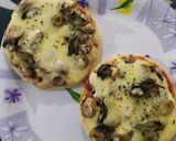 Foto del paso 5 de la receta: ArePizzas de champiñones queso y albahaca