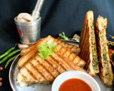 A picture of step 11 of Thecha Cheese Sandwich.