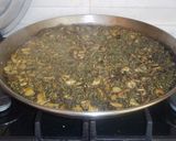 Foto del paso 8 de la receta Paella de calamares en su tinta y sin verduras