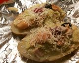 Foto del paso 6 de la receta: Patata asada, rellena de filetes de pollo al ajillo y perejil