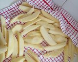 A picture of step 1 of Baked potato wedges.