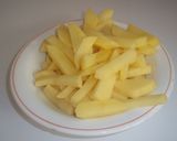 Foto del paso 4 de la receta Sepia plancha con picadillo y patatas fritas largas