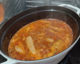 A picture of step 3 of Chipolata and Beans.