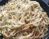 A picture of step 10 of Spaghetti Alfredo.
