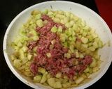 Foto del paso 4 de la receta Dados de calabacín salteados con carne