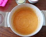 A picture of step 2 of White Chocolate Panna Cotta.