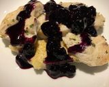 A picture of step 10 of Lemon Pepper Chicken with a Blueberry Orange Wine Sauce.