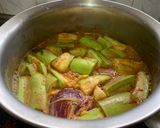 A picture of step 5 of Kerala Style Baingan Dal Curry.