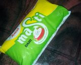 A picture of step 34 of Aloo fulcopi katla rosha ar misti doi.