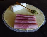 A picture of step 1 of Savory Croissants with Smoked Ham, Goat Cheese, and Pesto.