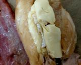 A picture of step 2 of My Chicken breast with Brie and Streaky bacon wrapped around. 😋.