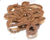 A picture of step 5 of Ragi murukku with onion garlic flavor.