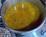 Foto del paso 10 de la receta Garbanzos y langostinos con reducción de las cabezas