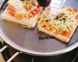 A picture of step 5 of Cheese burst pizza 🍕🍕😋 kids favourite.