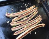 Une image de l'étape 6 de Maxi chipolatas marinées grillées ail et romarin.