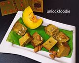 A picture of step 7 of KAKHARU PODA PITHA (pumpkin cake).