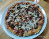 Foto langkah ke 8 dari resep Homemade Pizza (dengan ragi).