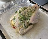 A picture of step 2 of Garlic Butter Roast Chicken with herbs.