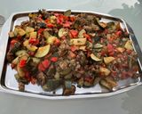 Une image de l'étape 12 de Bœuf aux poivrons, courgettes et tomates.