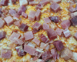 Foto del paso 3 de la receta: Tortipizza de patata y cebolla con jamón serrano