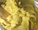 A picture of step 4 of "Mshenye"/smashed bananas and sweet potatoes.