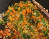 A picture of step 13 of Nigerian fried rice.