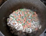 A picture of step 14 of Baked Rice, Chicken and Mushrooms (American biryani).