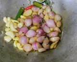 A picture of step 2 of Bamboo shoots Tomatoes Potato Chokha.