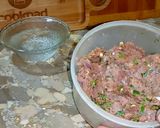 A picture of step 2 of Kachay qeemay k kabab with puri.