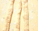 A picture of step 4 of Chicken filled cones.